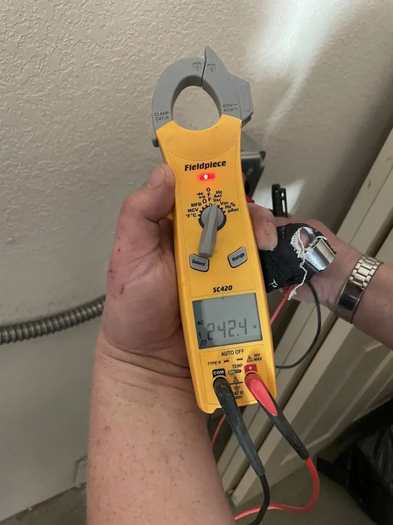 Voltage testing with clamp meter during Electrical Installation Services in North Las Vegas